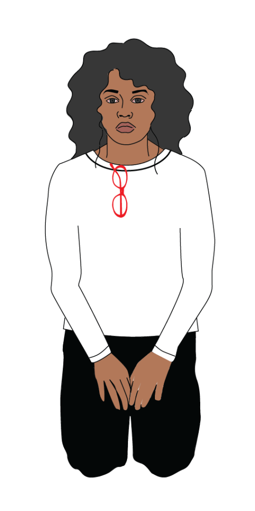 A person with brown skin and dark curly hair knees while placing their hands between their thighs to avoid touching their eyes. They are wearing a white long-sleeved shirt and black pants, and their red glasses are hung on the collar of their shirt.