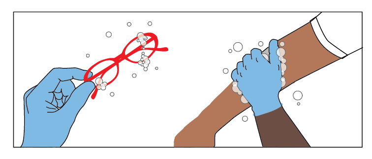 A gloved hand cleans a person’s red glasses and the exposed skin on their arm with soap and water.